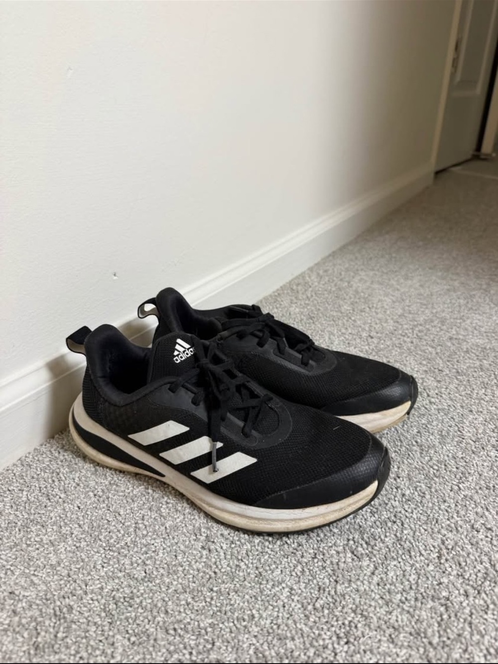adidas Black Sneakers with White Label Accent